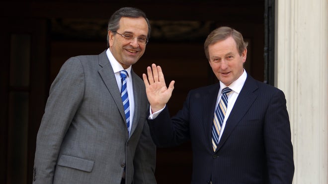  Greece's conservative-led government can't lower taxes before the public deficit falls further, the prime minister said Thursday, but he pledged to eventually slash the corporate tax rate to a flat  percent.